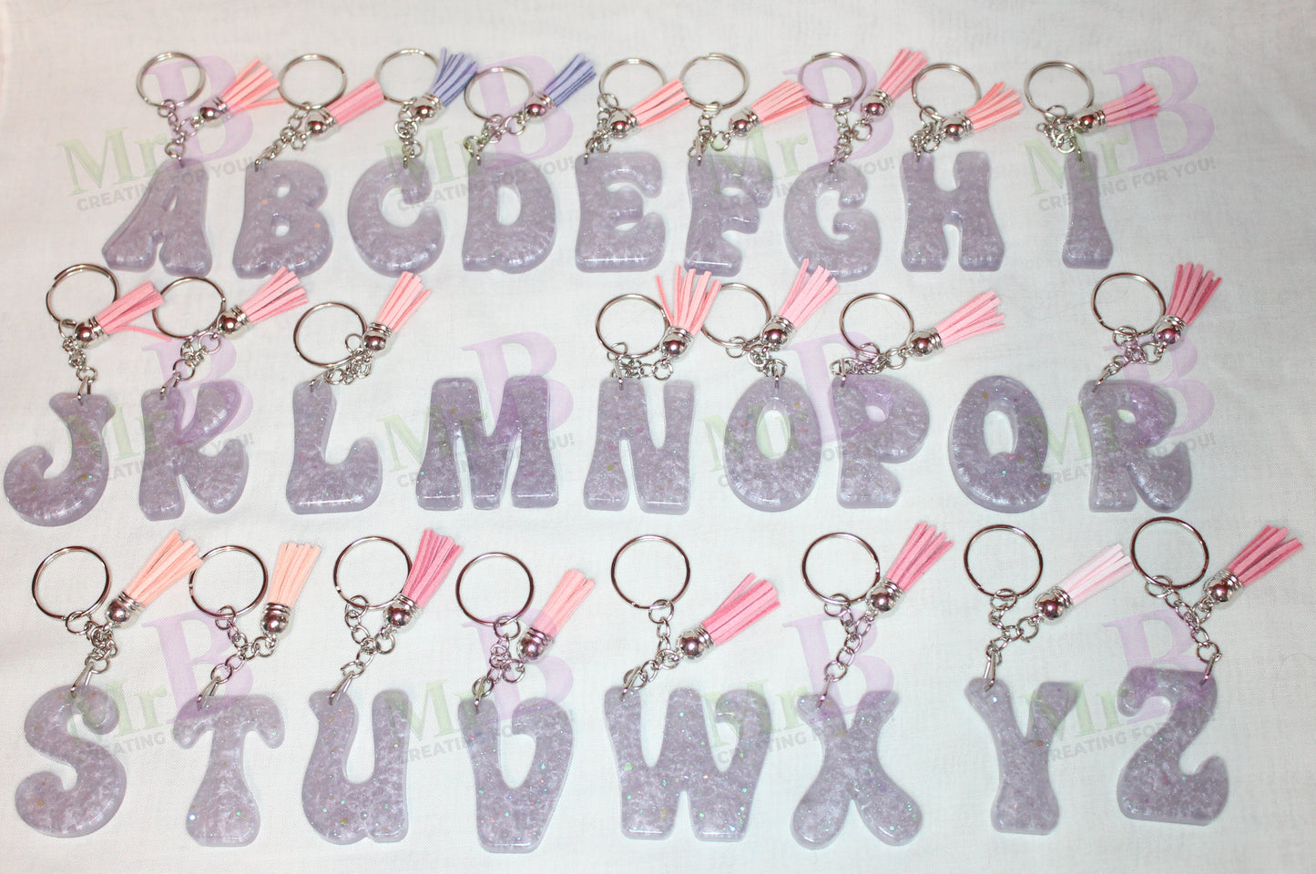 Pastel Glitter Resin Letter Keychain – Pink Tassel Charm